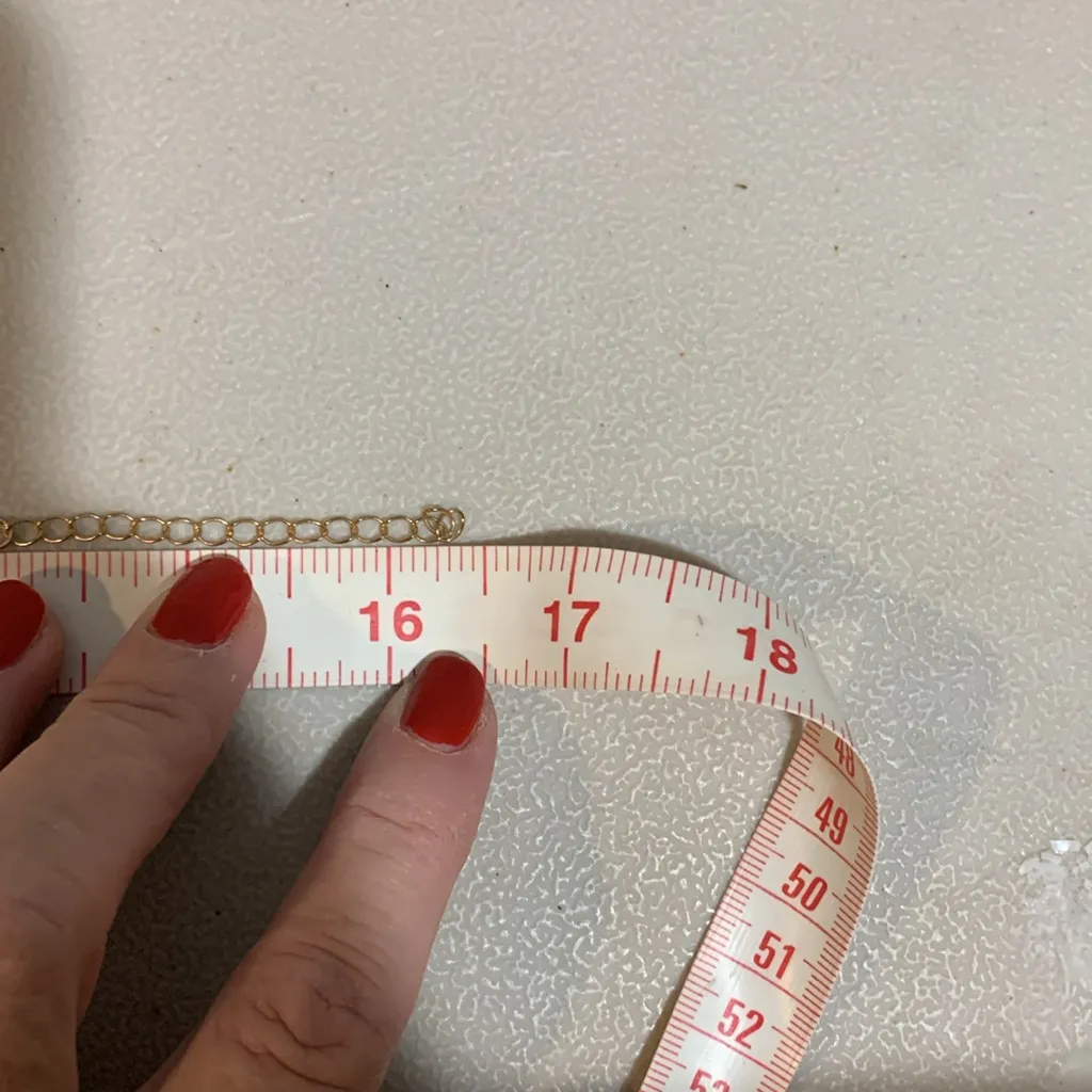 NWOT Gold colored star necklace in box - Image 2