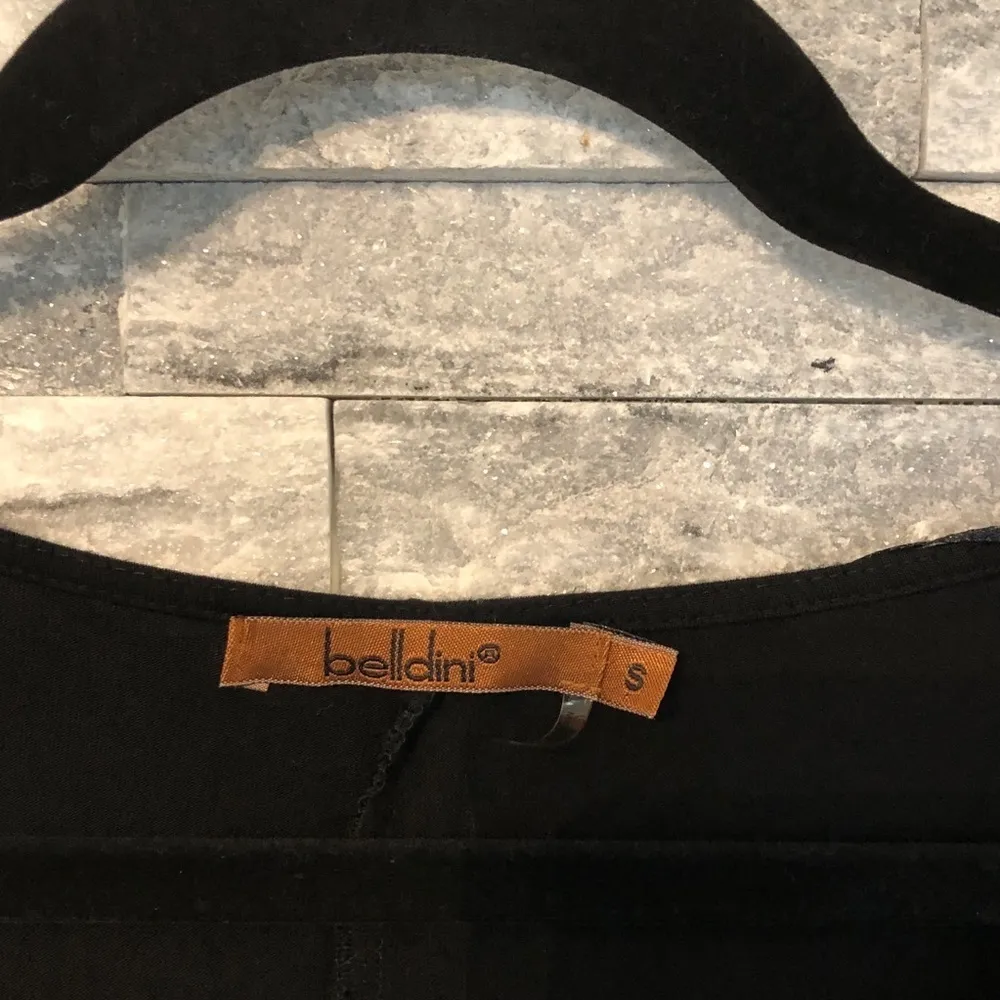 Black 3/4 sleeve with stud and mesh accents - Image 3