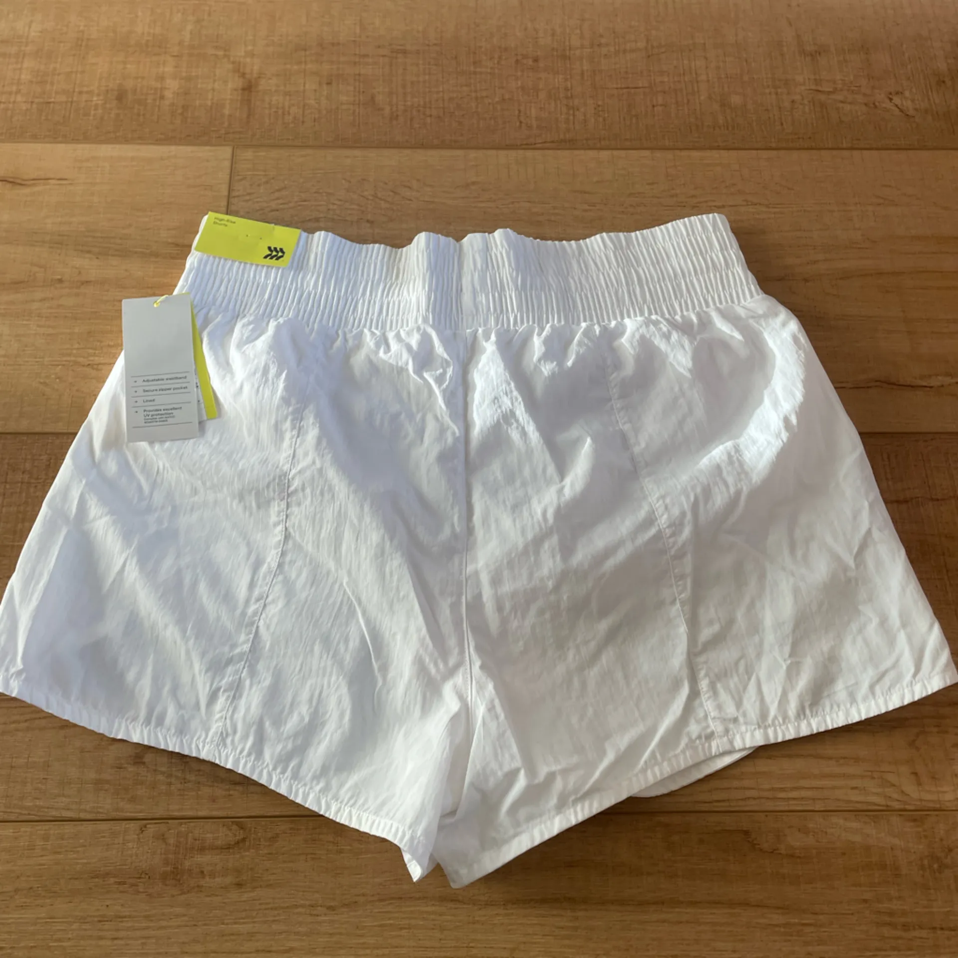NWT All In Motion Athletic Shorts white Size medium UV protection zipper pocket - Image 2