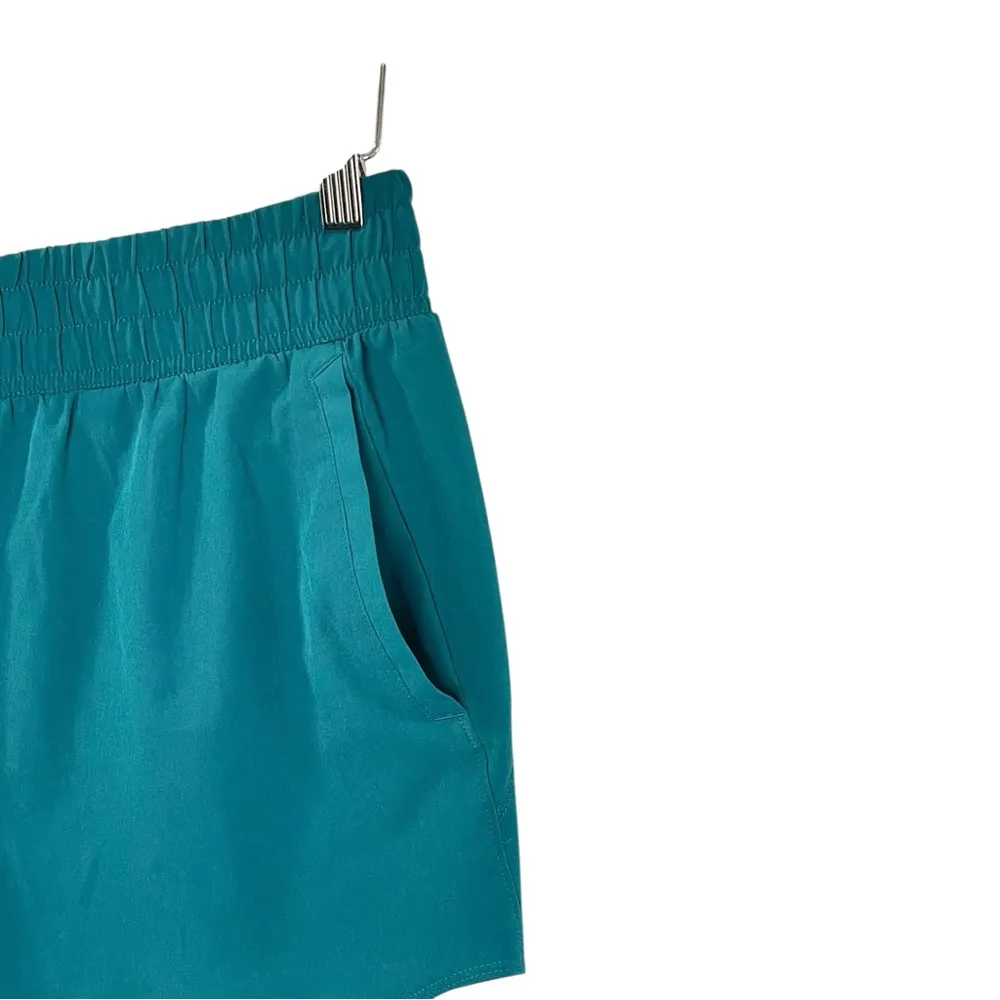 Under Armour®
Fly By 3" Shorts Teal green size large RN 96510 - Image 6