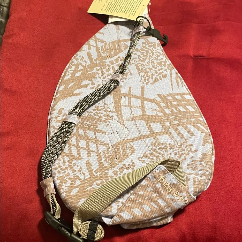 Kavu Mini Sling Bag with Pattern in Light Blue and Brown - Image 4