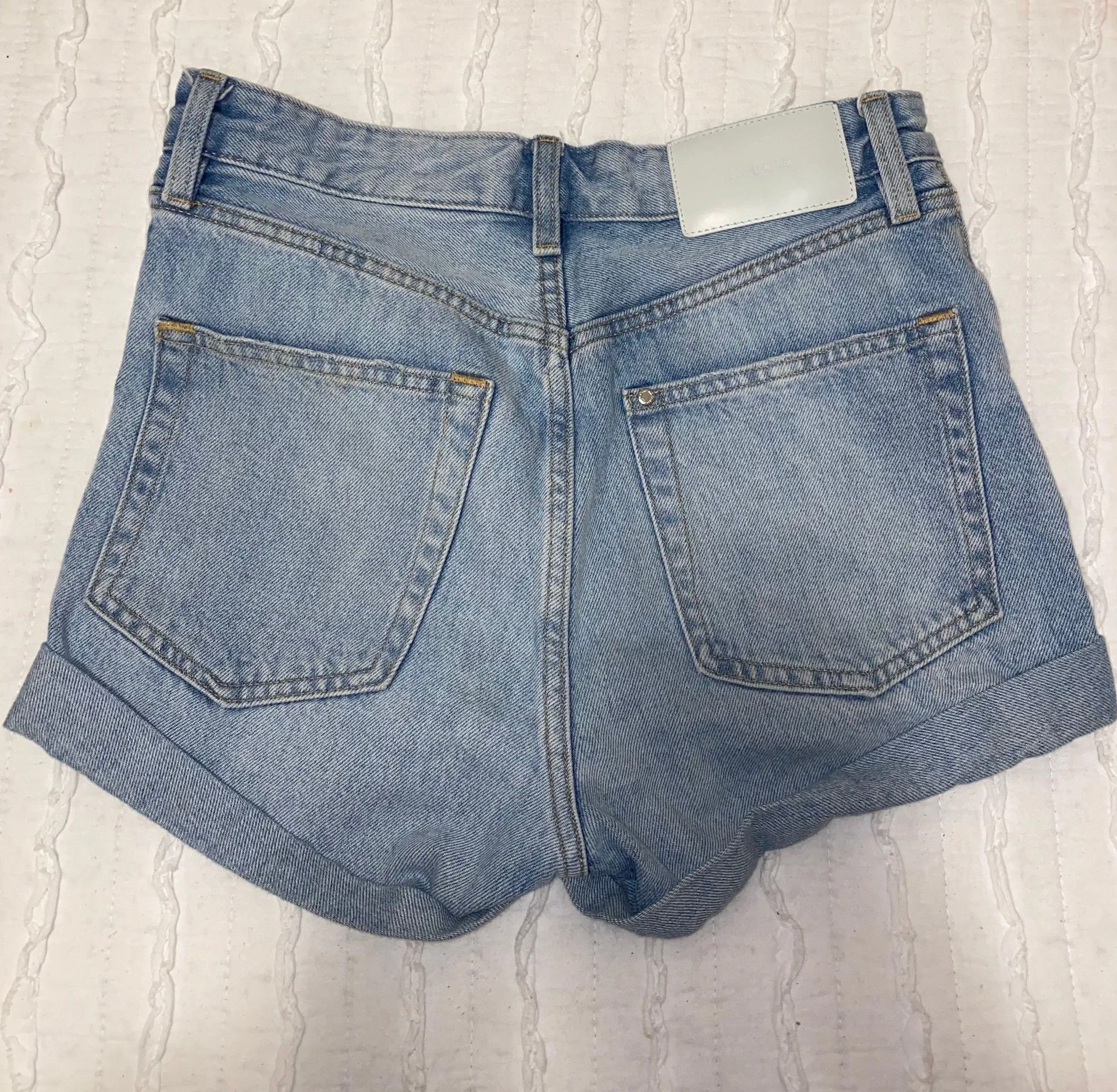Light wash buttoned up XS high waisted jean shorts - Image 2