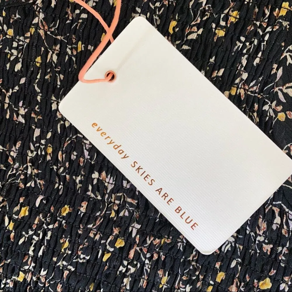 Skies Are Blue Ditsy Floral Smocked Mini Dress in Black - Image 4