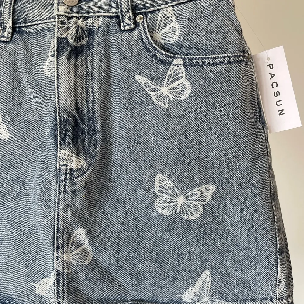 PacSun new with tags butterfly denim jean skirt in a size 26 - Image 12