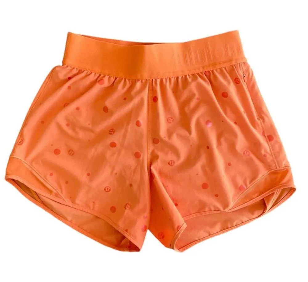 Lululemon Women’s Size 6 Poco Logo Foil Print Orange Hotty Hot 4" Shorts - Image 5