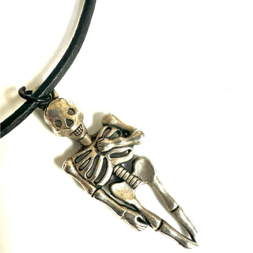 Silver tone skeleton pendant necklace on black cord - Image 7
