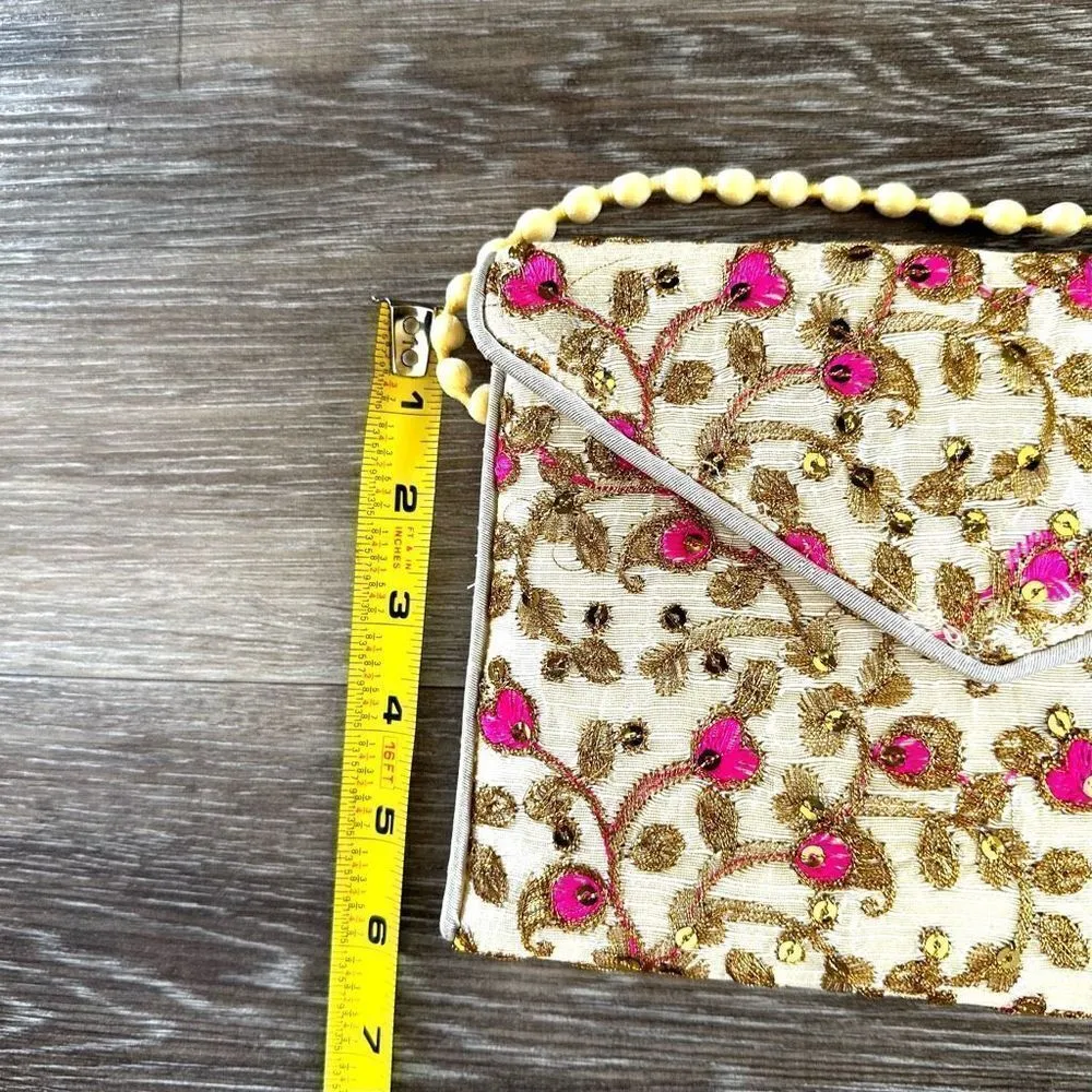 Embroidered multicolored pom Pom strap crossbody purse - Image 10