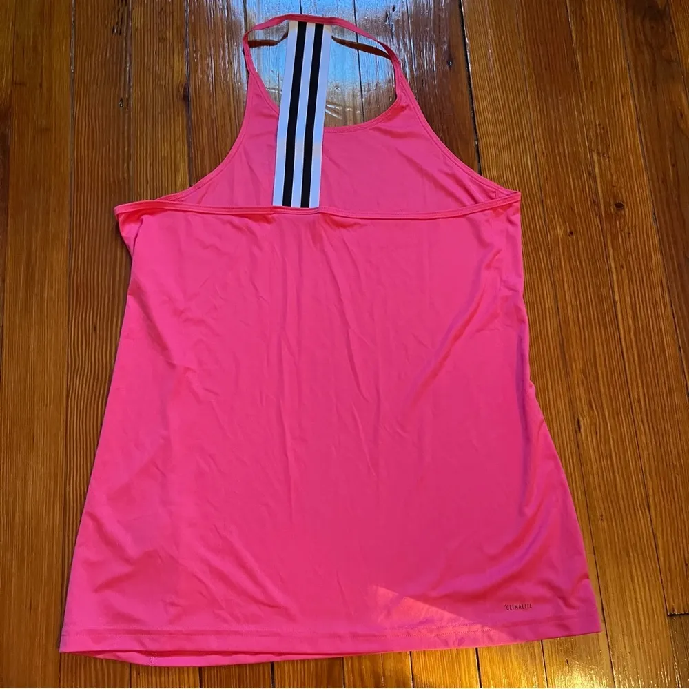 Adidas pink workout tank with black and white stripe detail in back. Size Large - Image 4