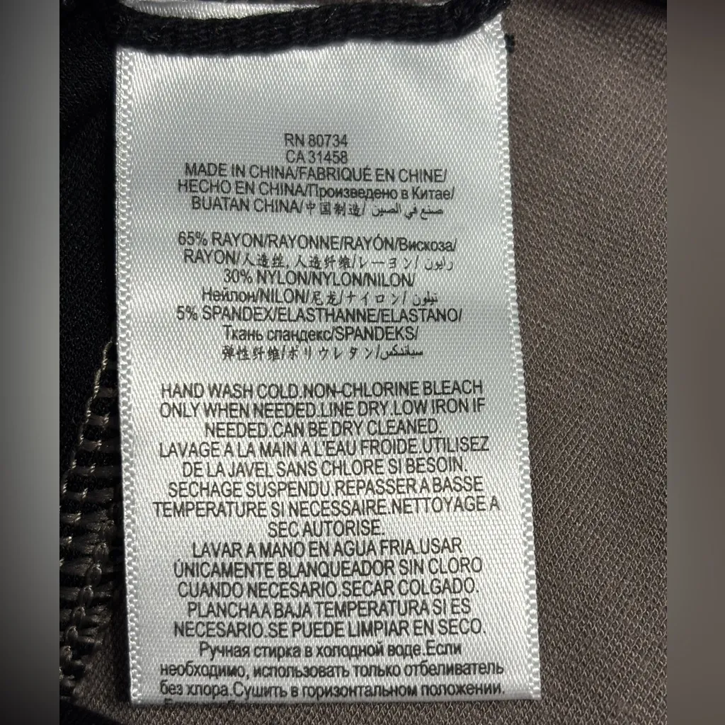 BCBGMaxAzria Tan and Black legging pant size Small - Image 6