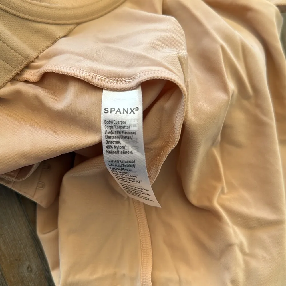 SPANXshape™ Suit Your Fancy
Strapless Cupped Mid-Thigh Bodysuit - Image 6