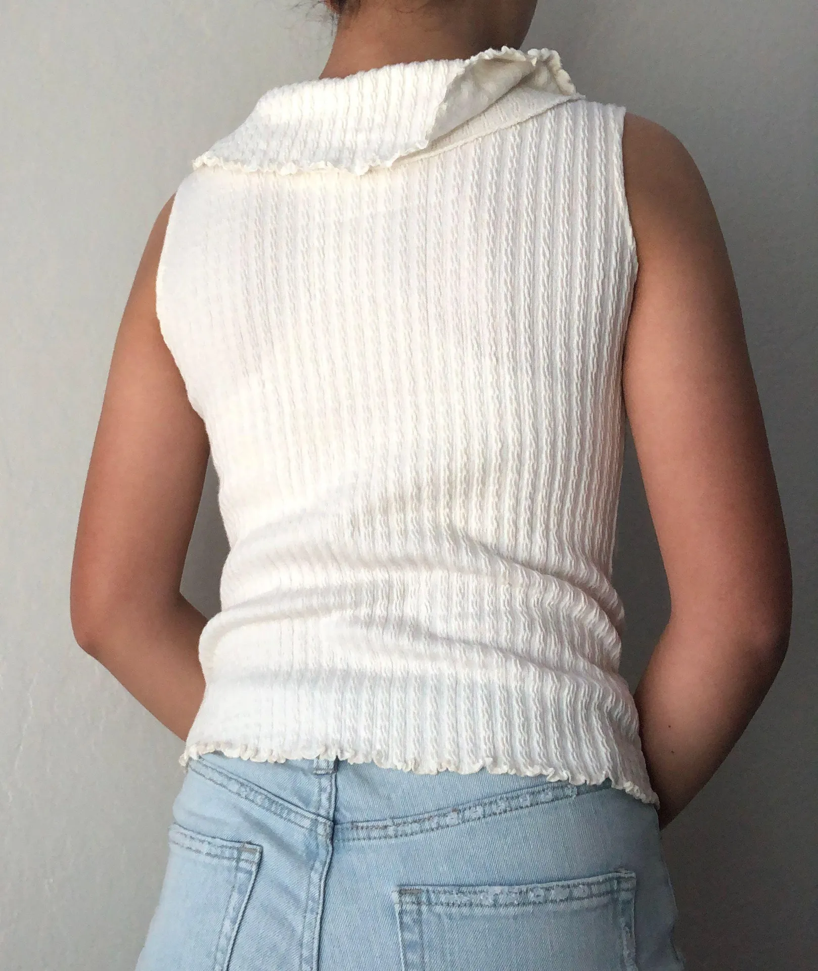 white sleeveless ruffle turtleneck inspired shirt - Image 2