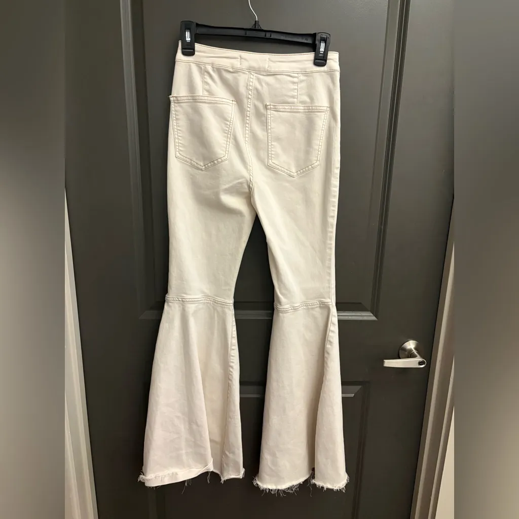 We The Free by Free People "Just Float On" flare jeans in a white denim wash. - Image 3