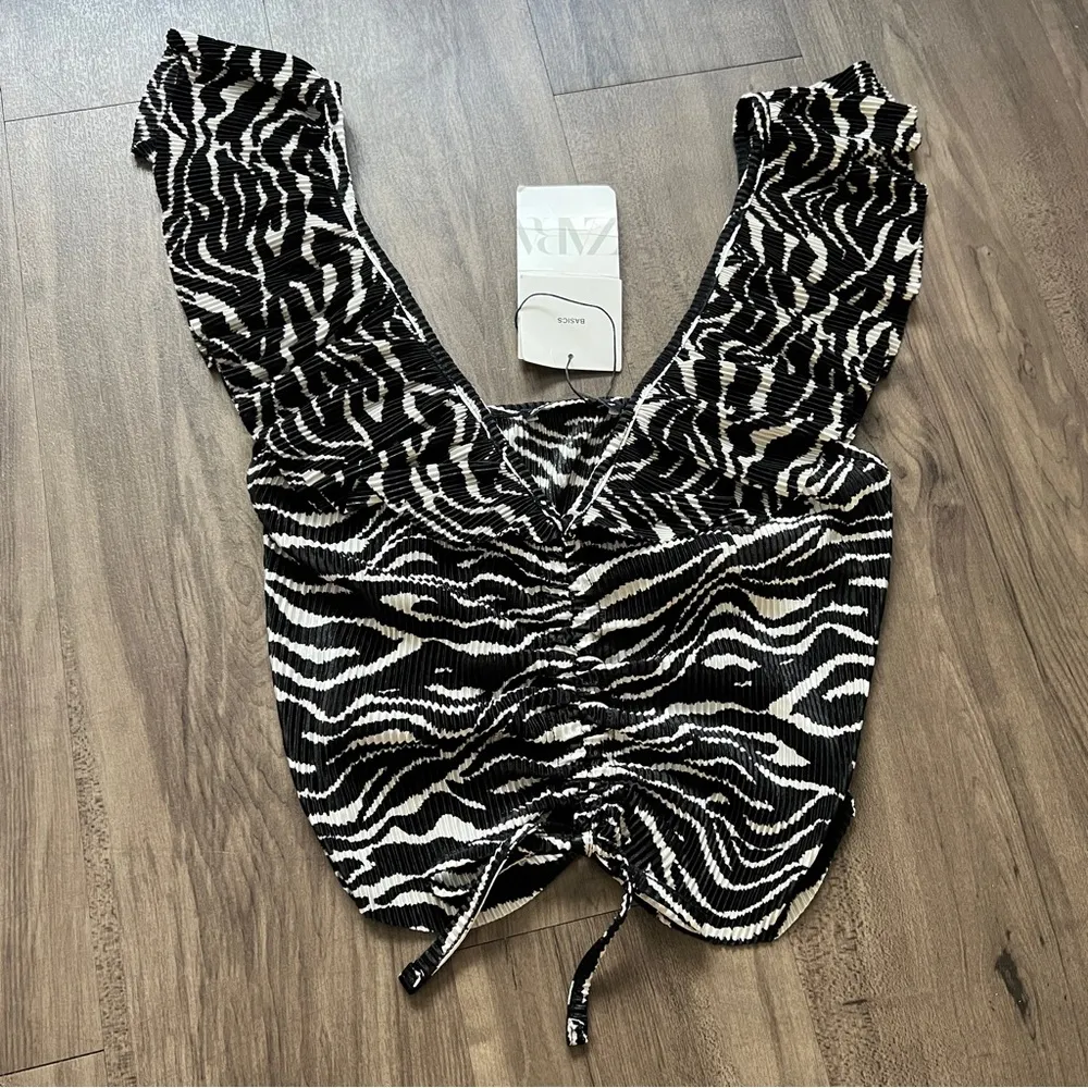 NWT-  ZEBRA PRINT RUFFLE TOP WITH ADJUSTABLE FRONT STRINGS - Image 8