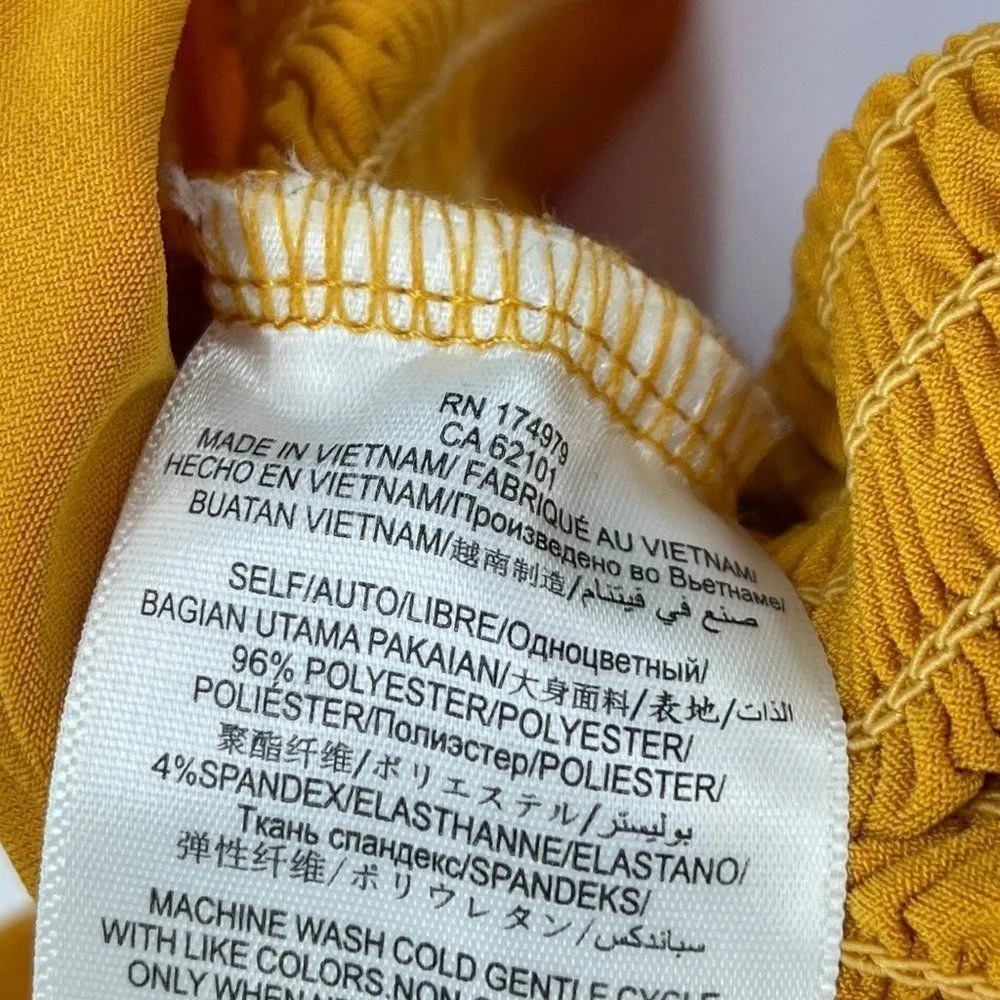 BCBGeneration Off the Shoulder Smocked Ruffle Top - Image 8