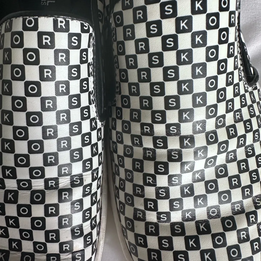 Michael Kors Monogram Slip-On Sneakers in Black and White - Image 8