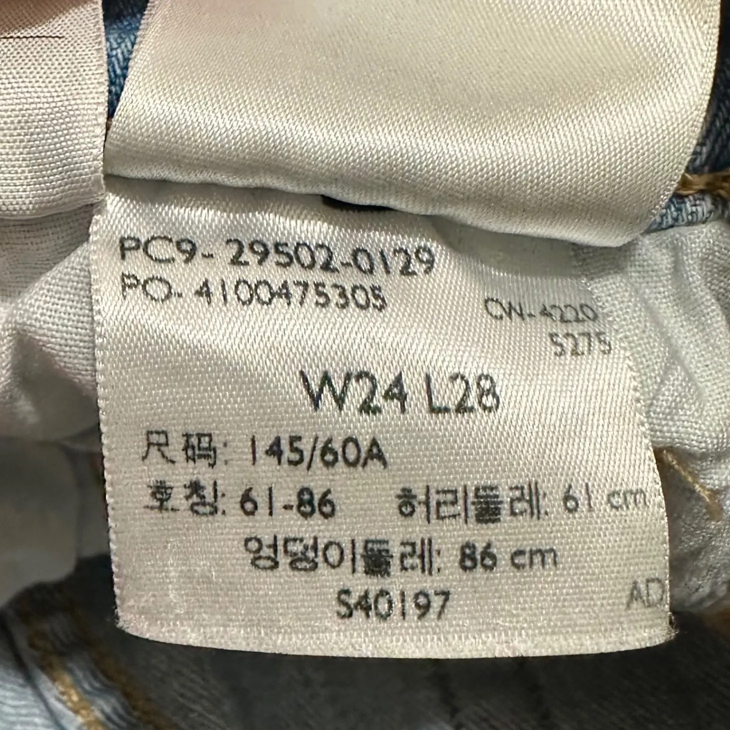 LEVI'S | Women's 501 Raw Hem Light Wash Hidden Button Blue Denim Jeans, W24 L28 Size undefined - Image 7