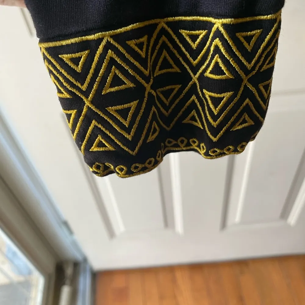 Gold and Black Pullover Hoodie with Decorative Band - Image 3