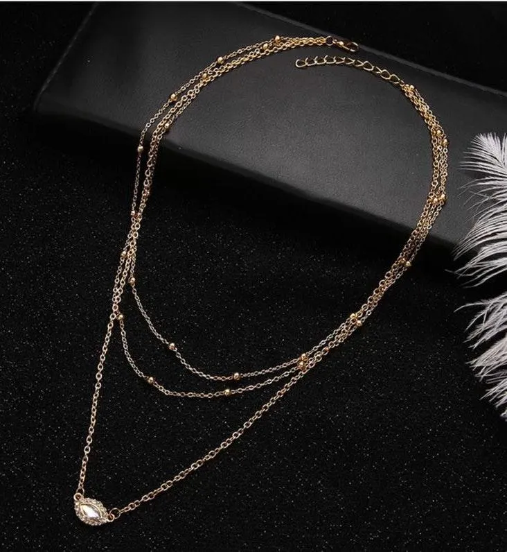 Multi Layer Gold Beads & Charm Necklace - Image 6