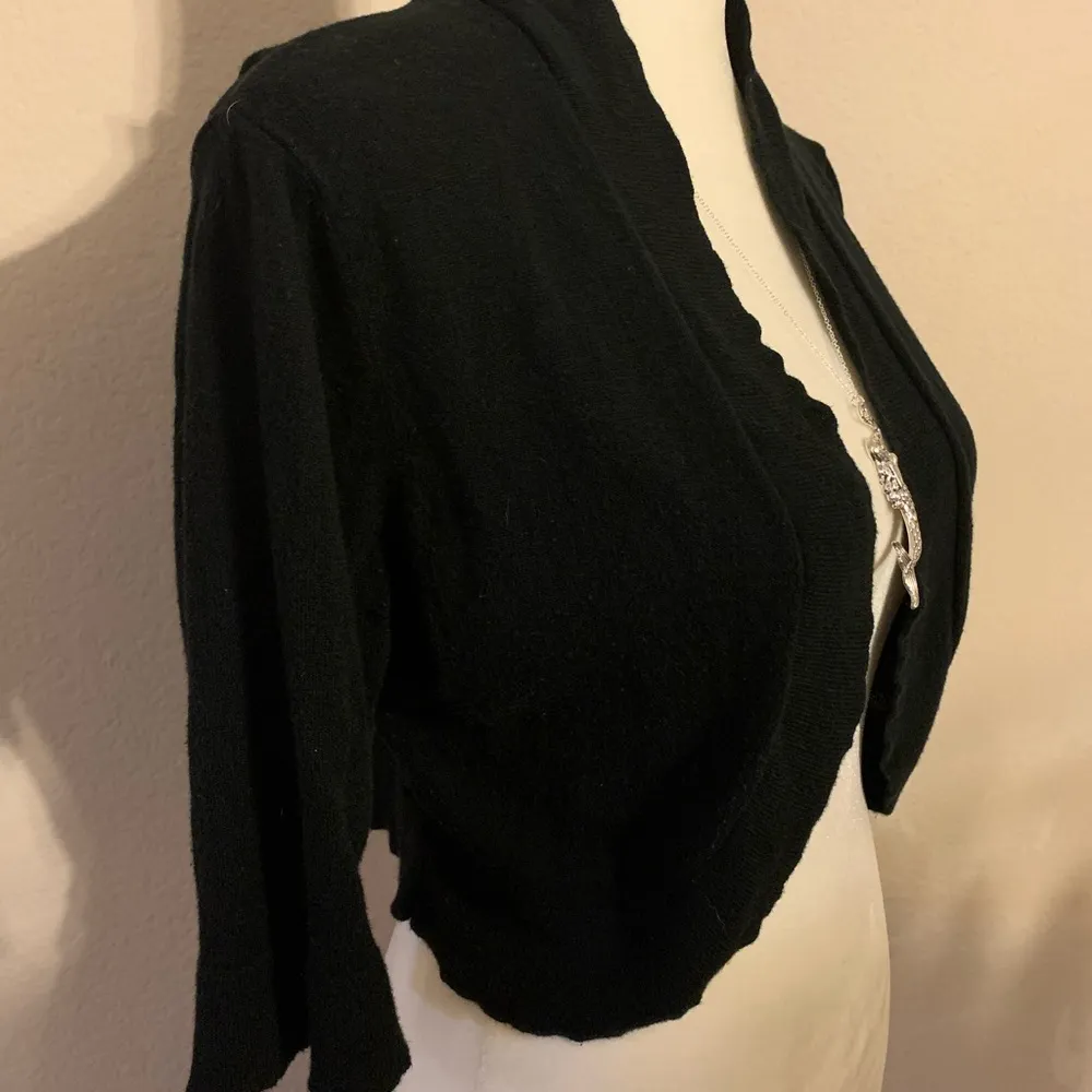 Juniors Bolero Cut Black Sweater.See the scalloped edges around the whole - Image 2