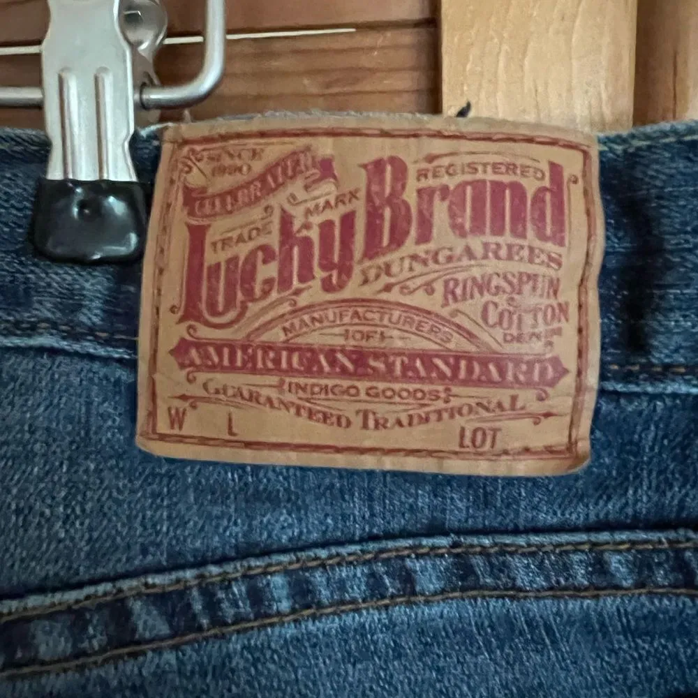 Lucky Brand lightly distressed bootcut medium wash jeans size 12 - Image 10