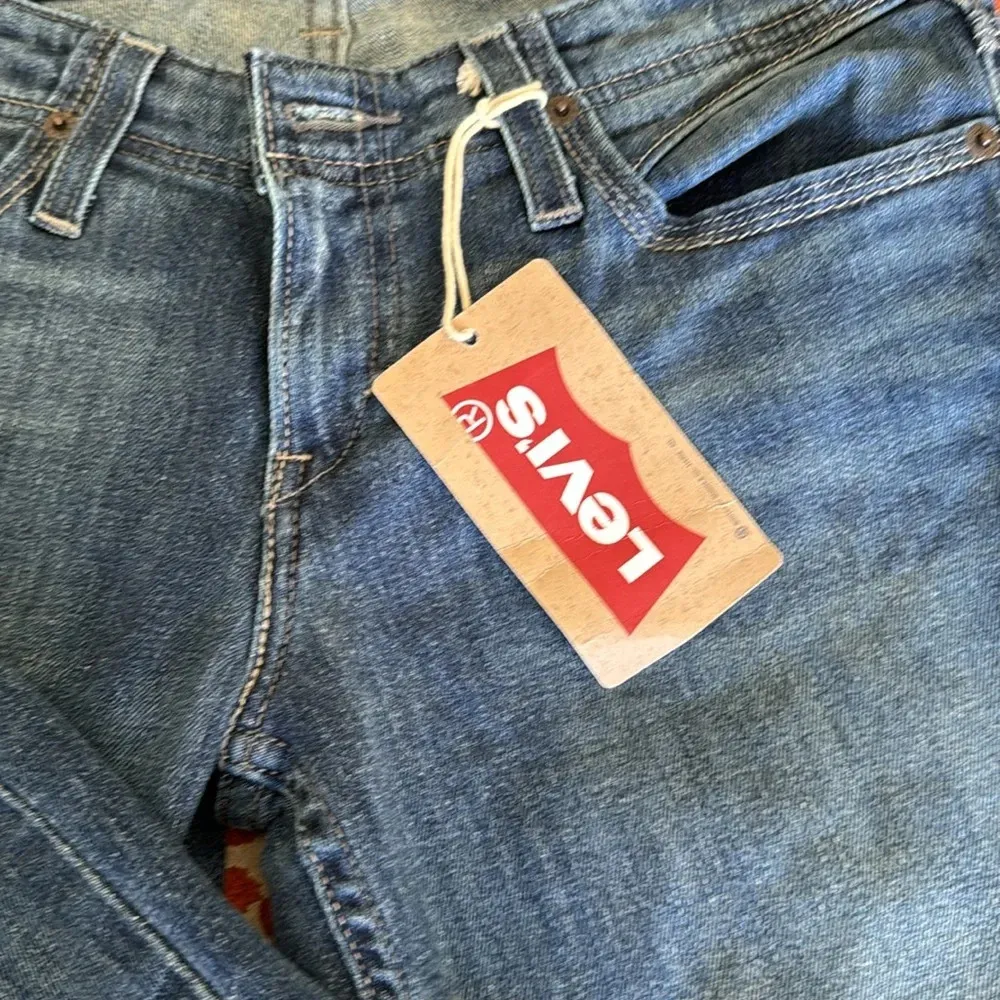 Levi’s flare ultra low rose stretch floral pocket size 5 M NWT rare find - Image 4