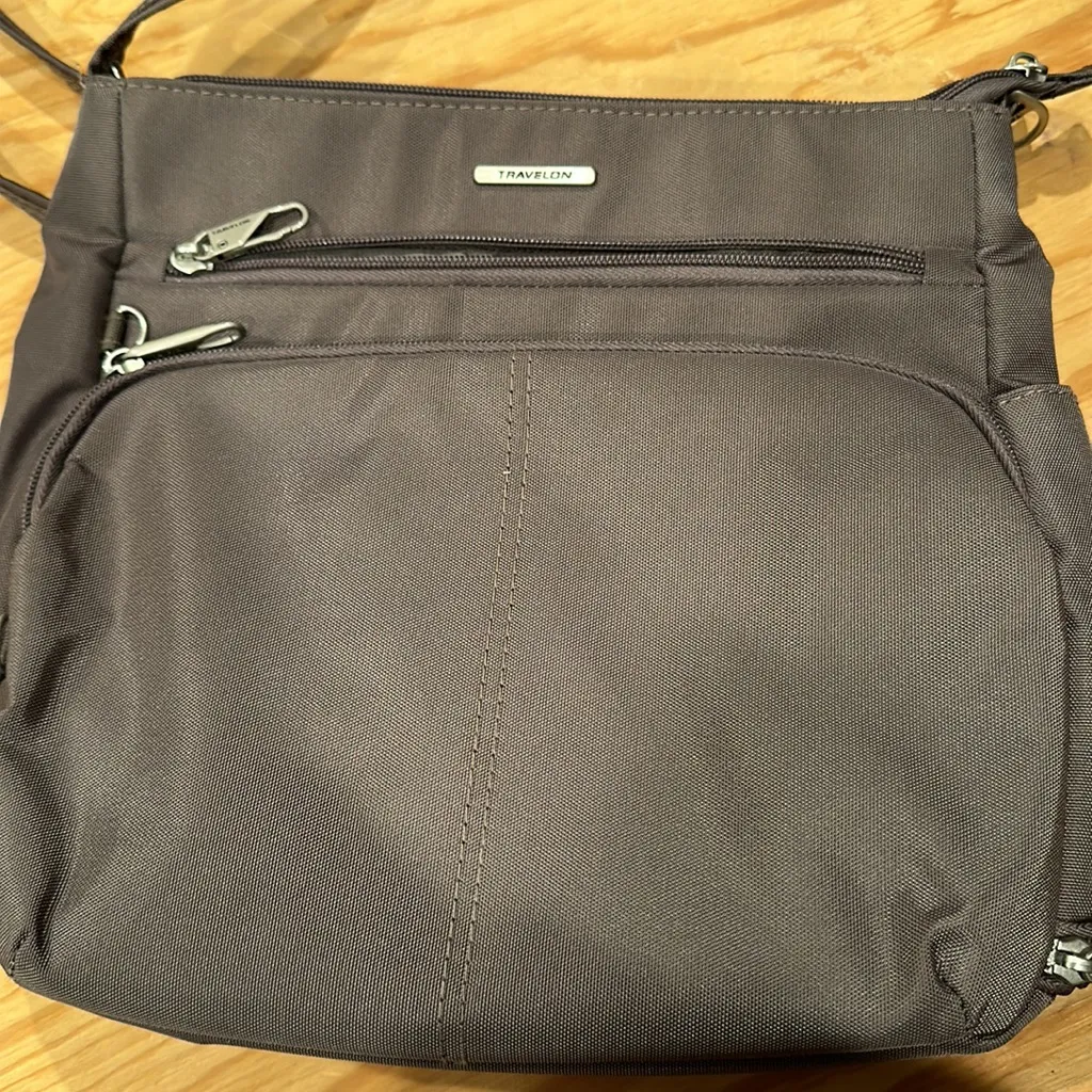 NWOT , anti theft Travelon crossbody , multiple zipper compartments - Image 12