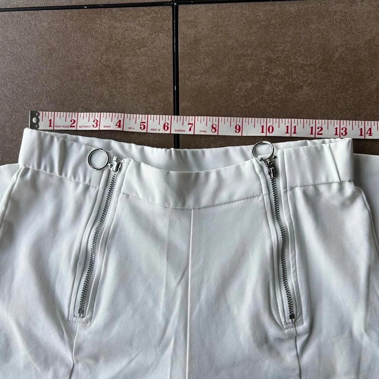 White slacks. High rise. Tapered fit. - Image 3