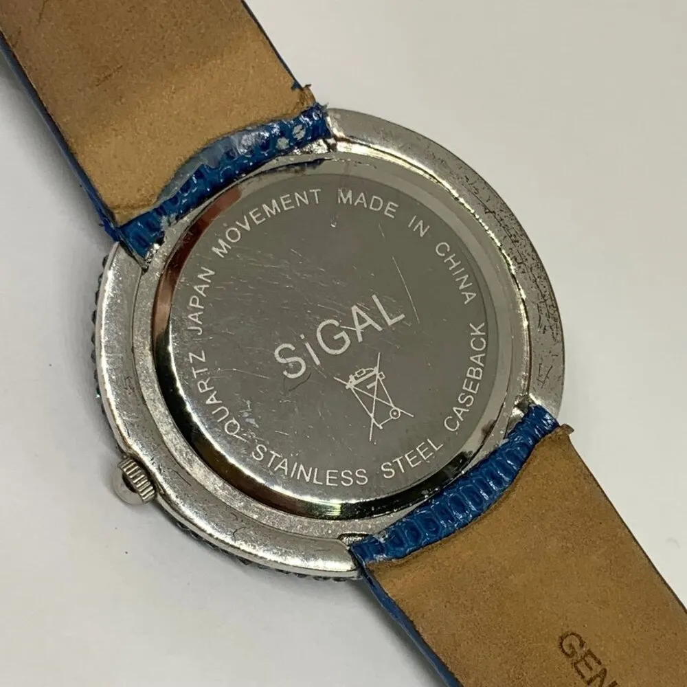 Sigal women’s quartz analog watch blue crystals dial bezel 39mm silver tone runs - Image 7