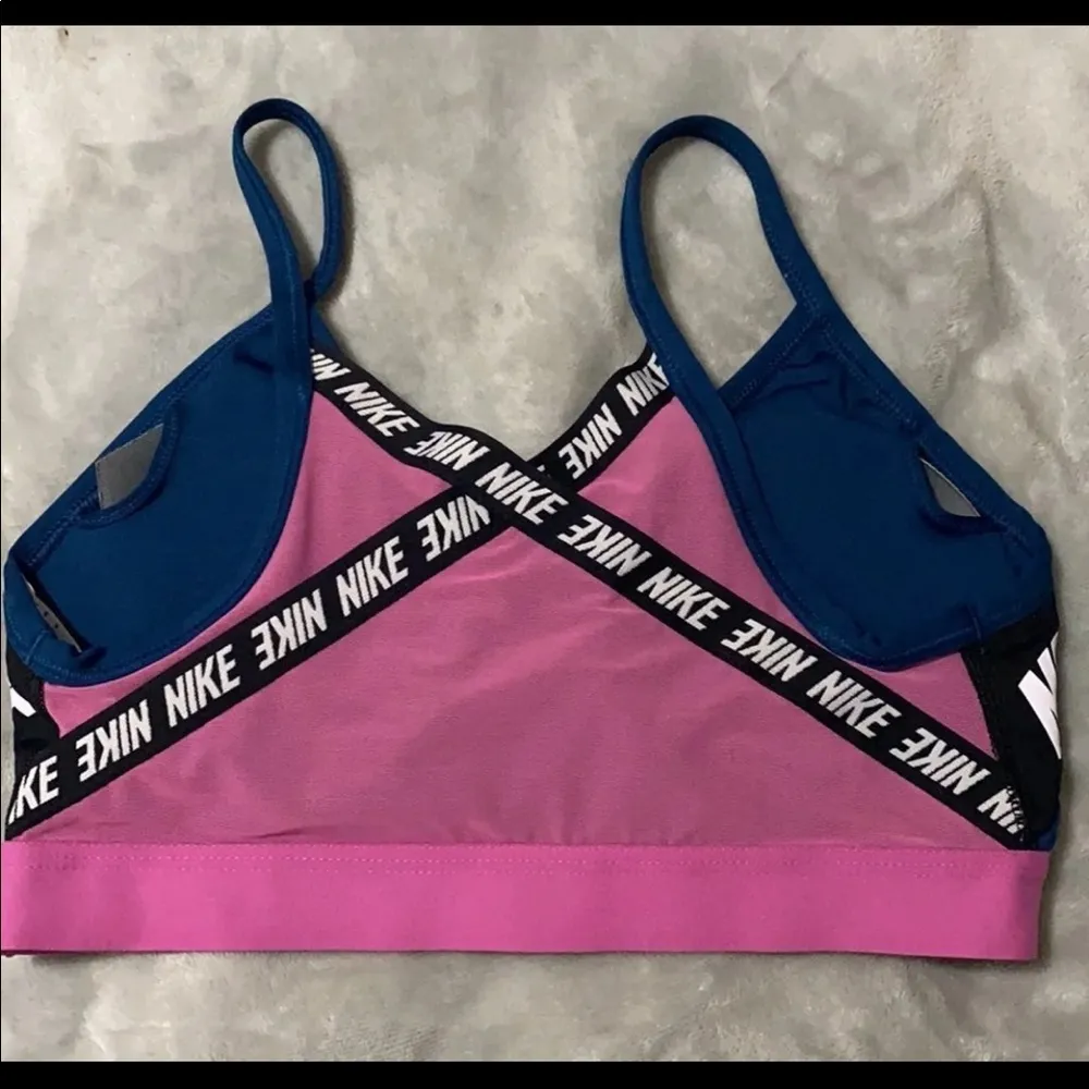 The Nike Indy Sports Bra in teal and pink - Image 6