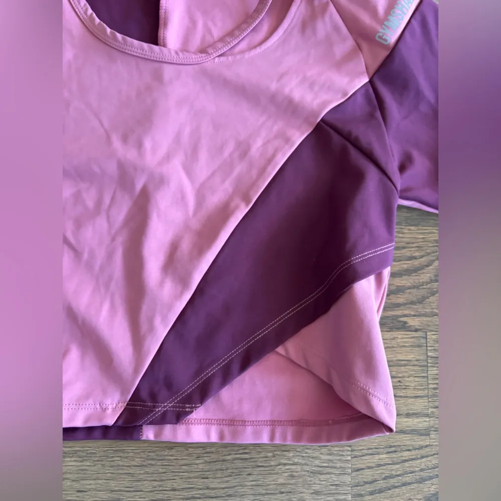 Gymshark Pink Asymmetric Short Sleeve Cropped Workout Top Size‎ Medium - Image 3