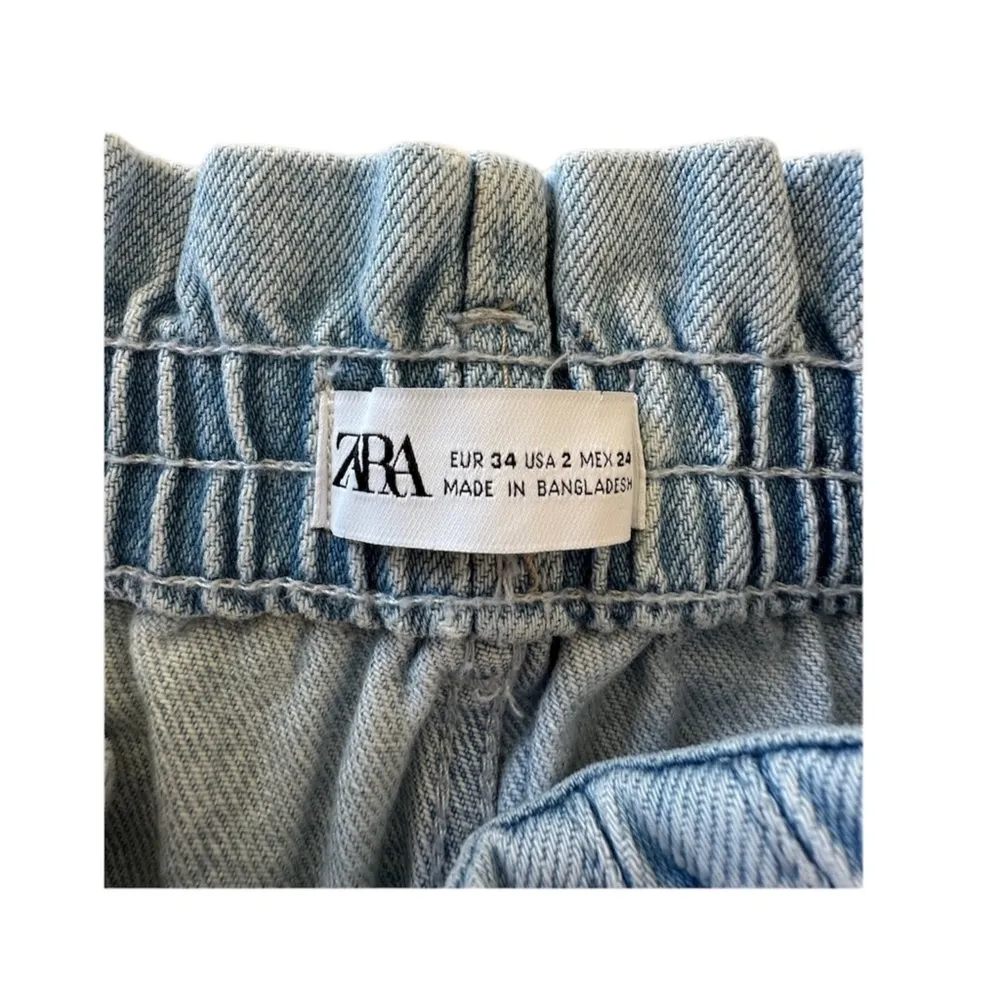 Light Wash Distressed High Waist Paperbag Pleated Cotton Denim Jean Shorts - Image 6