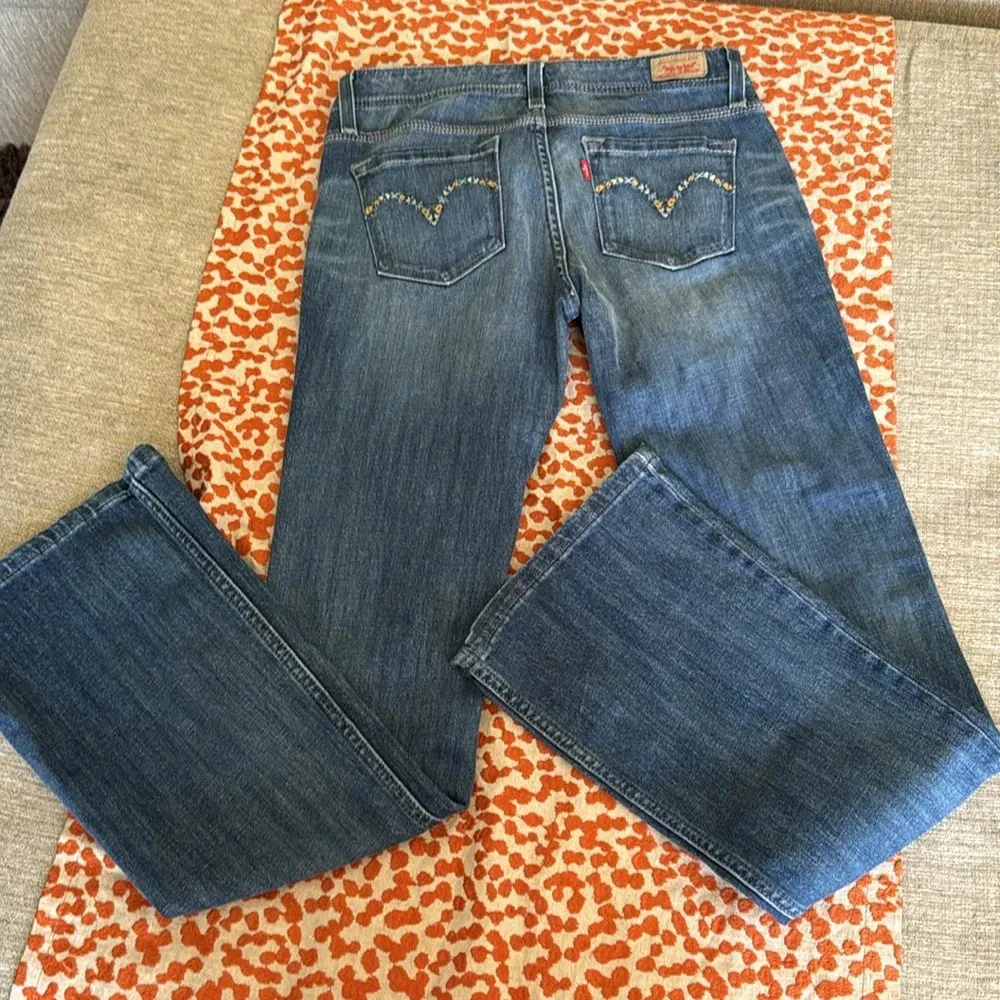 Levi’s flare ultra low rose stretch floral pocket size 5 M NWT rare find - Image 6