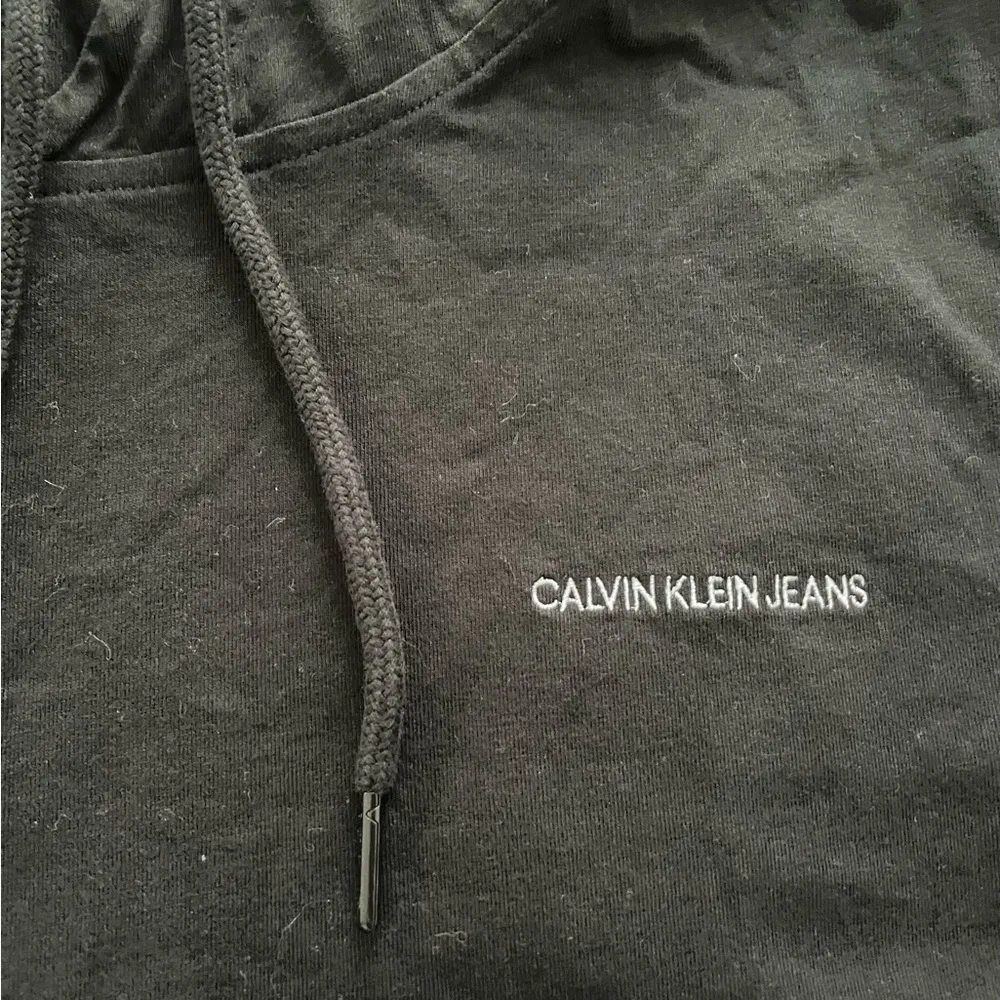 Calvin Klein Jeans Women’s Black 100% Cotton logo hoodie pullover sweater size M - Image 15