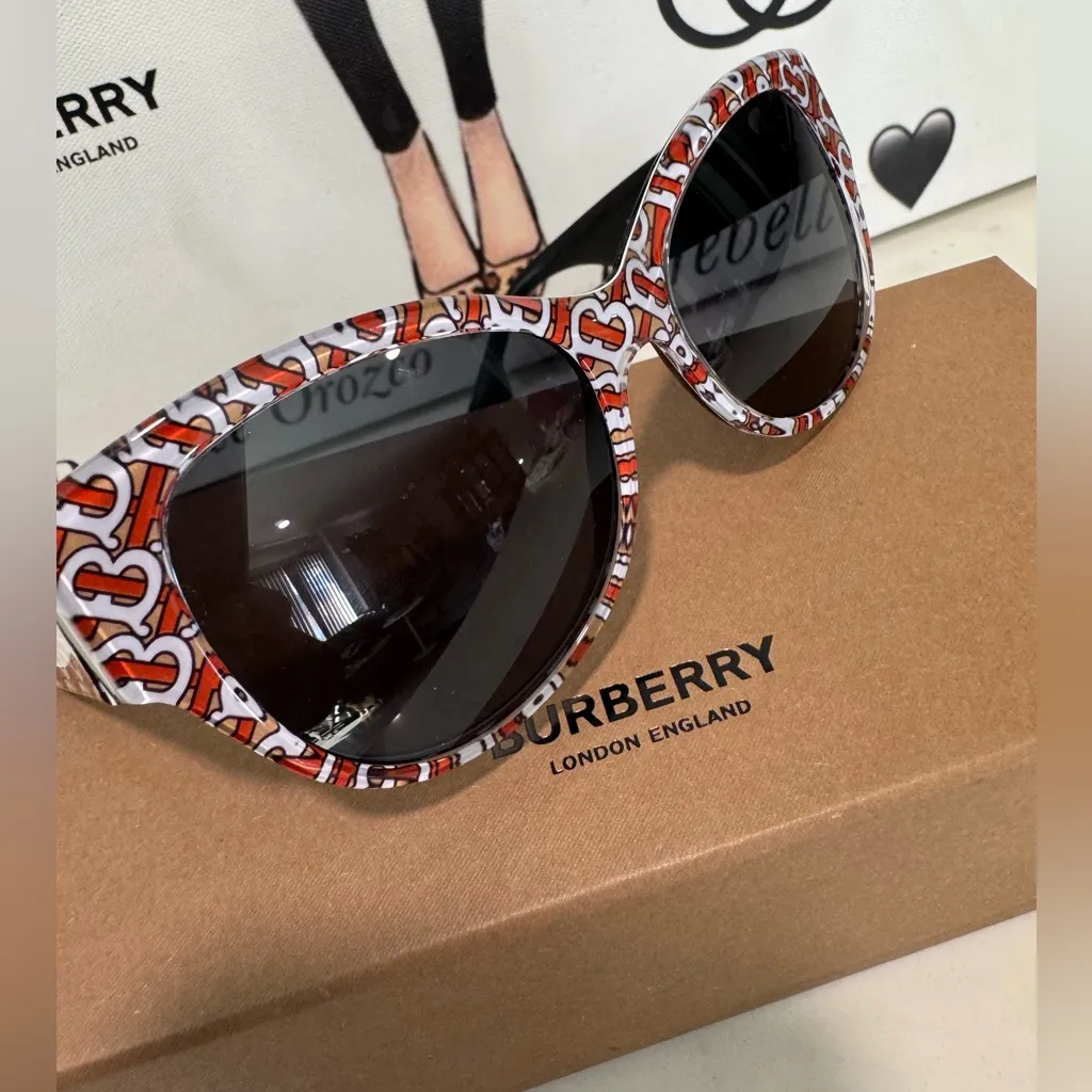 Burberry luxxotica Orange and White Patterned Sunglasses - Image 6