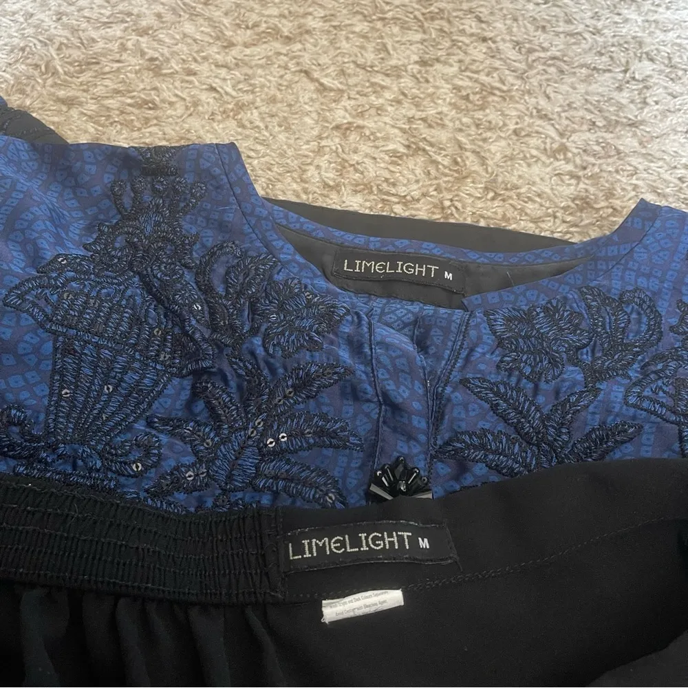 Elegant Blue and Black Lace Tunic - Image 10