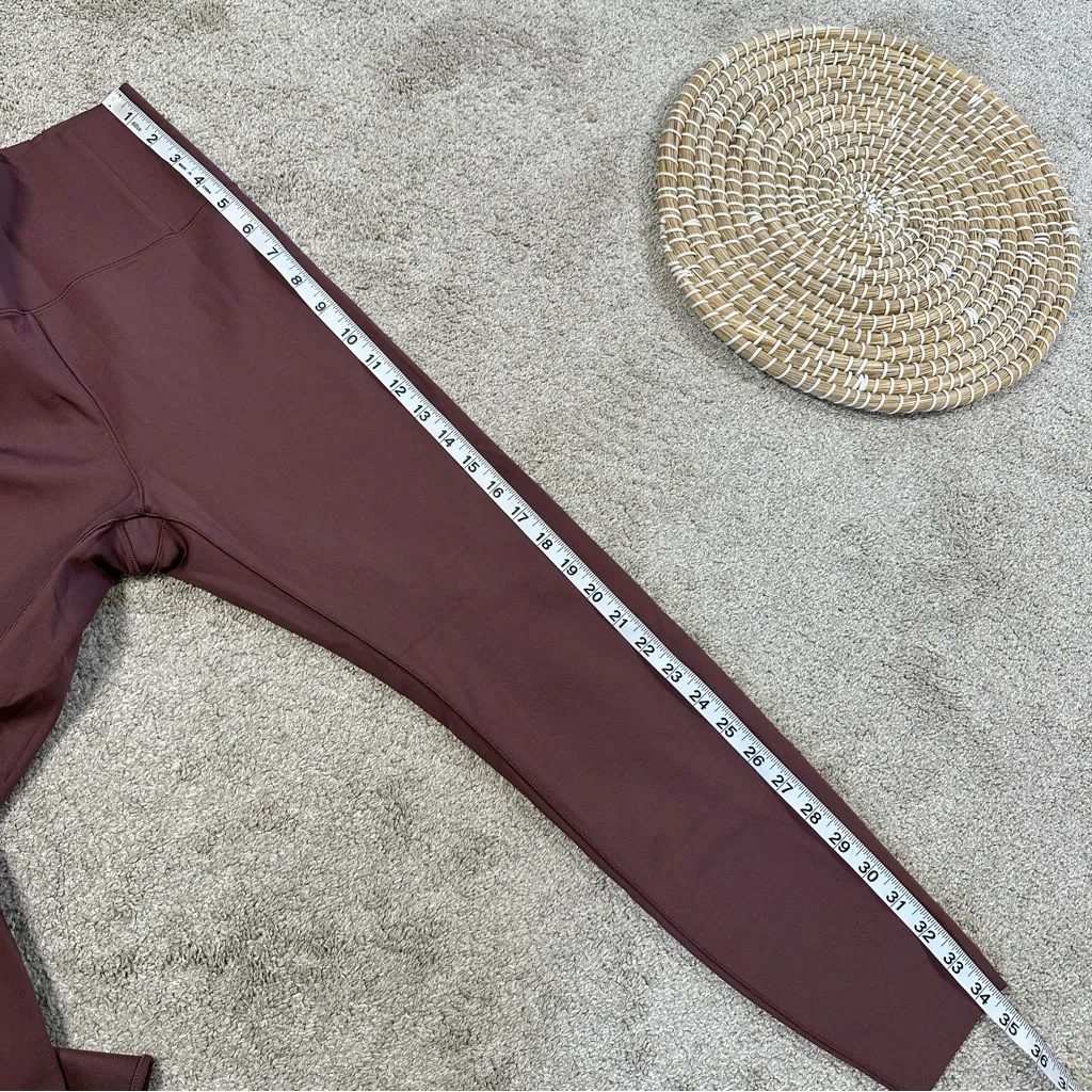 Vuori Women’s Evolve Uplift Leggings 24.5” High Waisted in Fig Maroon Size XS - Image 14