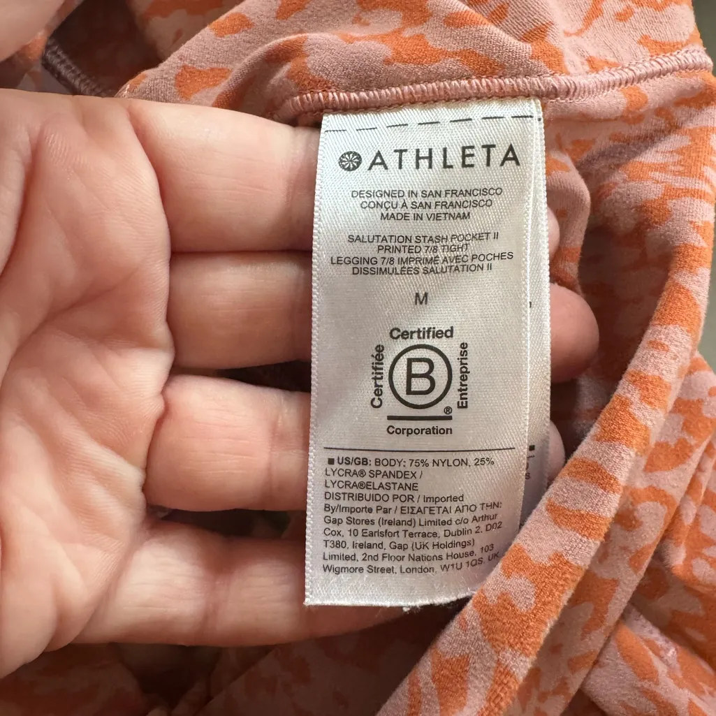 Women’s Athleta Salutation Stash II pink/orange 7/8 animal print leggings M - Image 5
