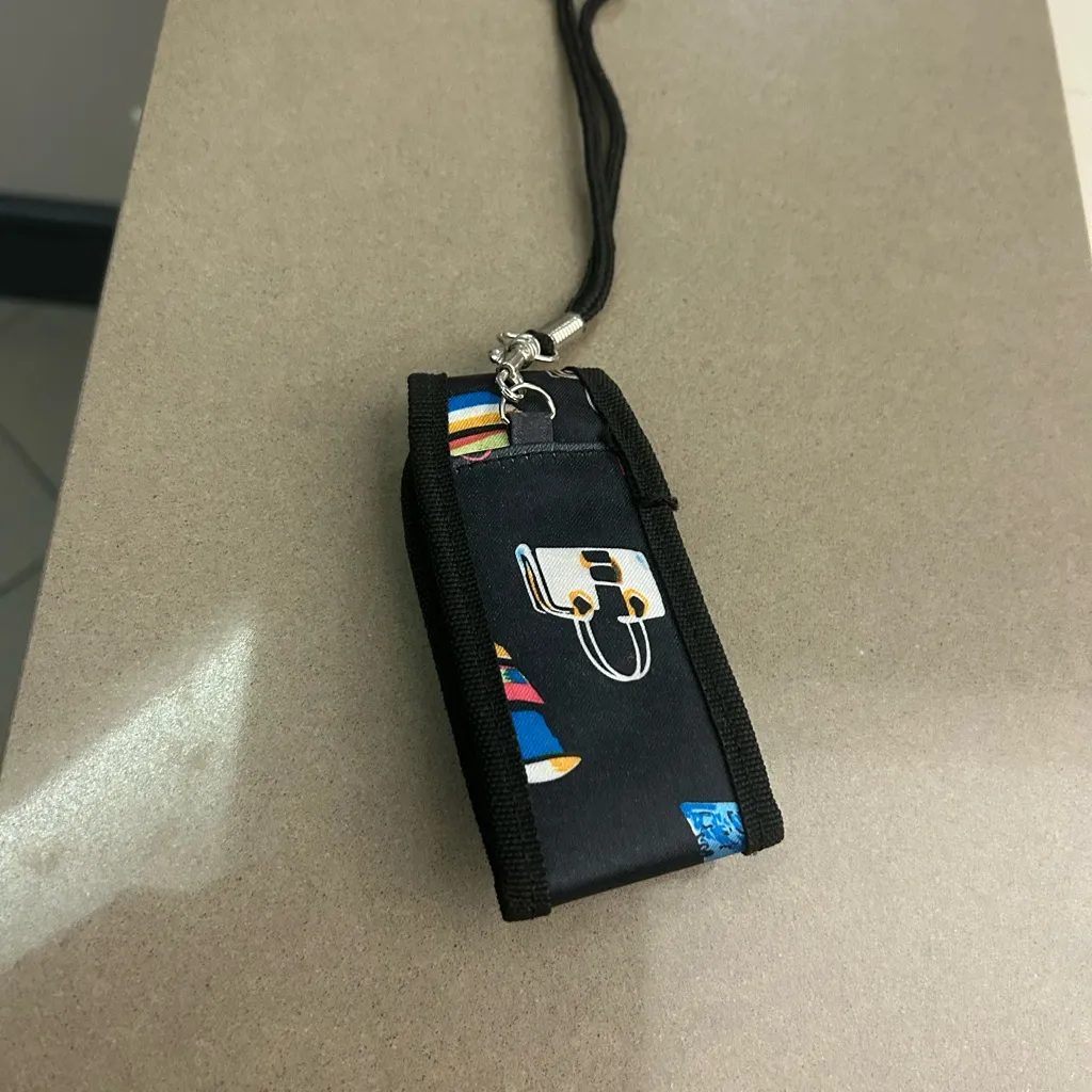 Black Phone Pouch with Vibrant Graphic - Image 2