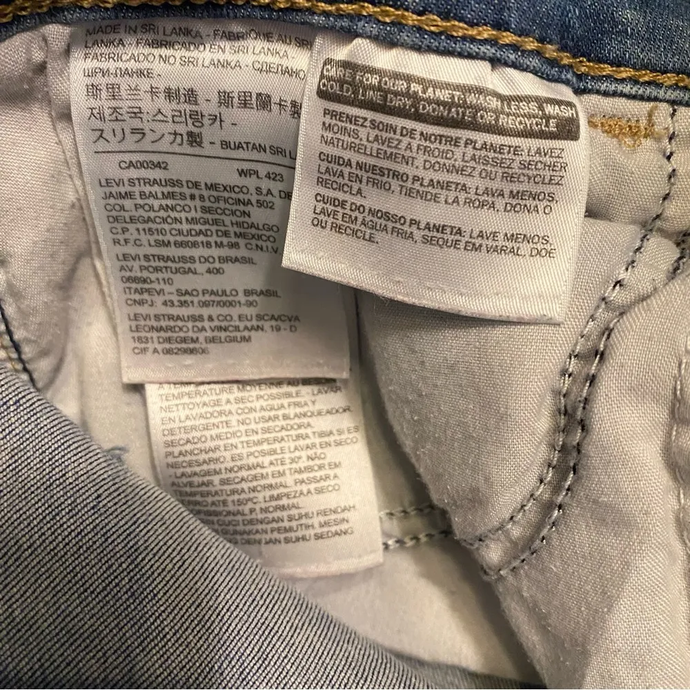 Levi’s Medium Wash Distressed 720 High Rise Super Skinny Jeans Size 31 - Image 9