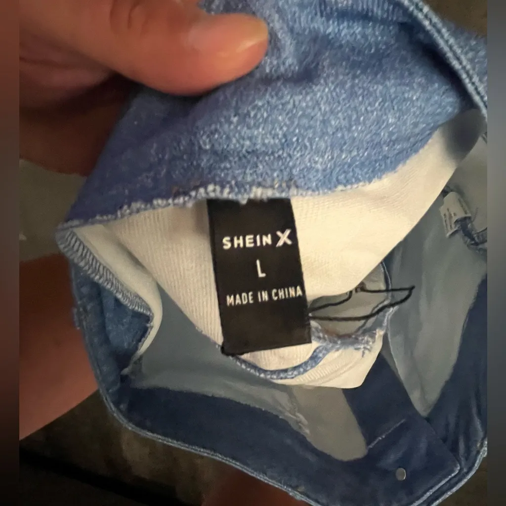 Like New! SHEIN X light blue denim skirt with an asymmetrical white ruffled hem - Image 3