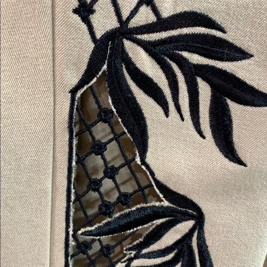 Size 8 pants  with peek thru cutouts on the side - Image 4