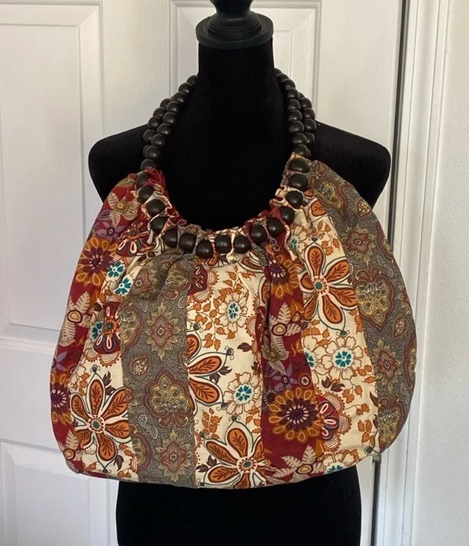 Chateau bohemian cloth shoulder bag with wooden beaded handle. - Image 1
