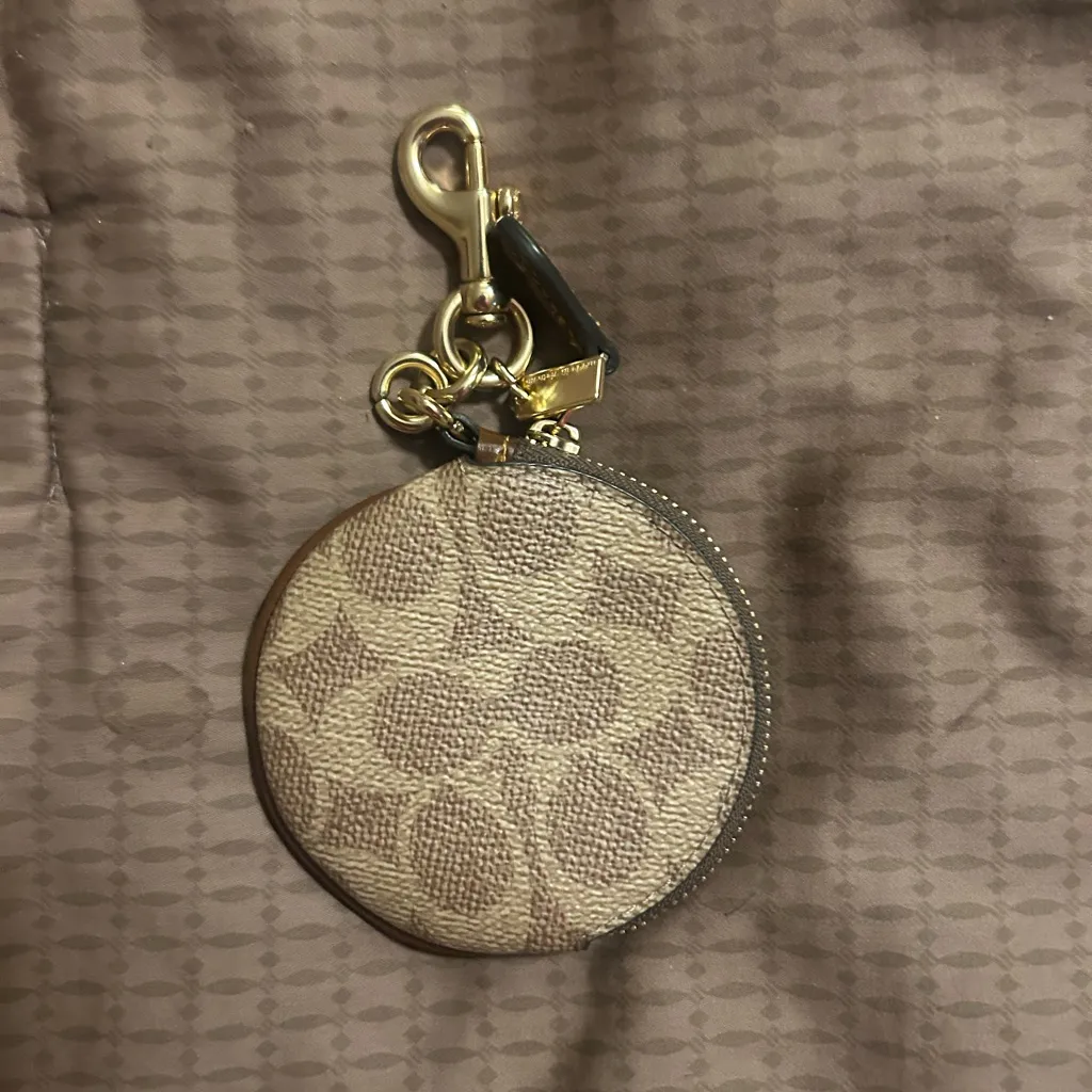 Coach Signature Canvas Circular Coin Pouch bag charm in the color khaki brown - Image 2