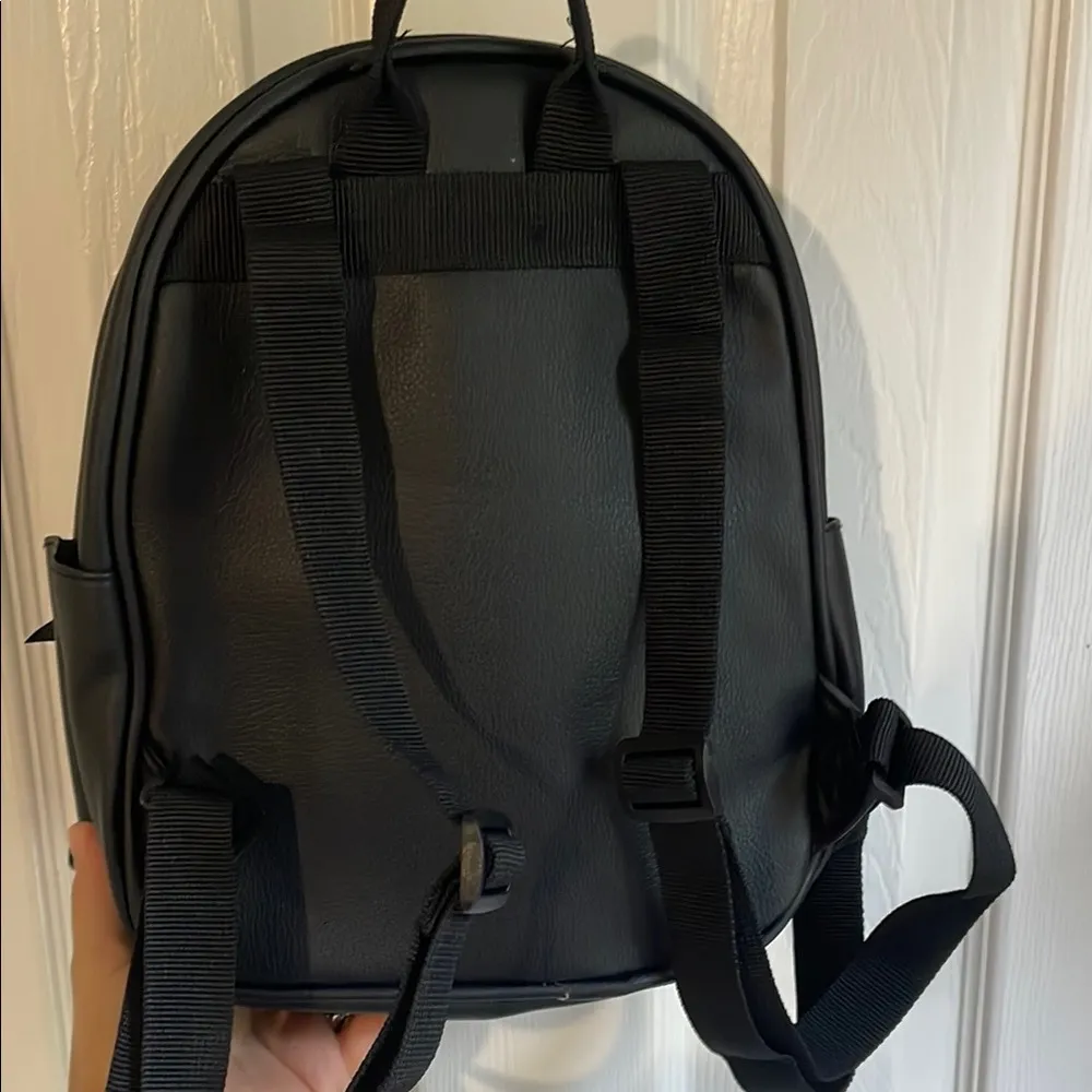 Loungefly Black and White Striped Backpack with Cartoon Design - Image 4