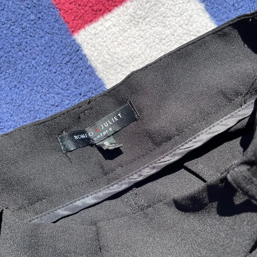 Romeo and Juliet Black dress pants with Red and white stripes at the side - Image 3