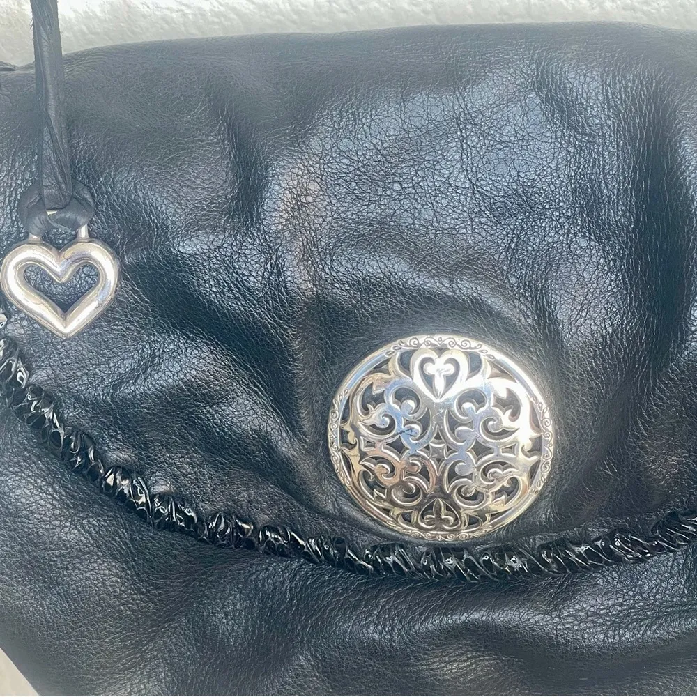 BRIGHTON black leather cross body bag with silver accents and chains and tassels - Image 4