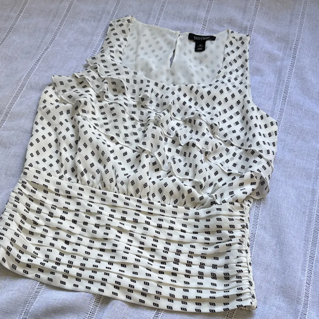 White House Black Market Sleeveless Blouse with Diamond Print and Ruffle Detail. - Image 14