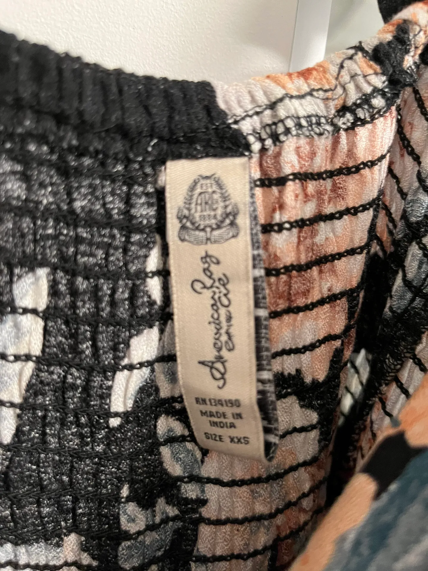 Black and Floral Jumpsuit with slits in legs - Image 5