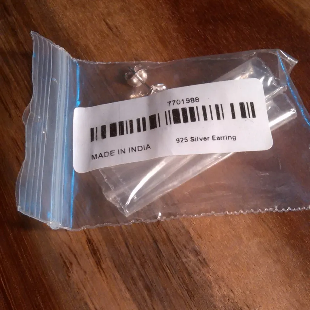 Diamond Accent Sterling Silver Floral Design Stud Earrings - Image 10