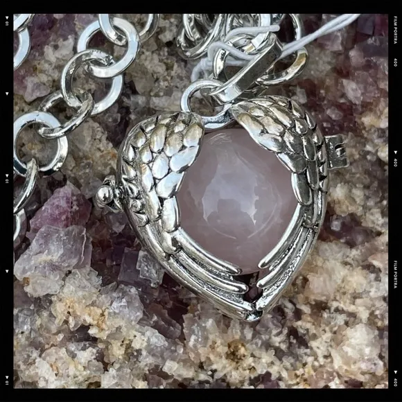 Rose Quartz gemstone in a winged heart shaped necklace cage. 36”chain. Heart o… - Image 6